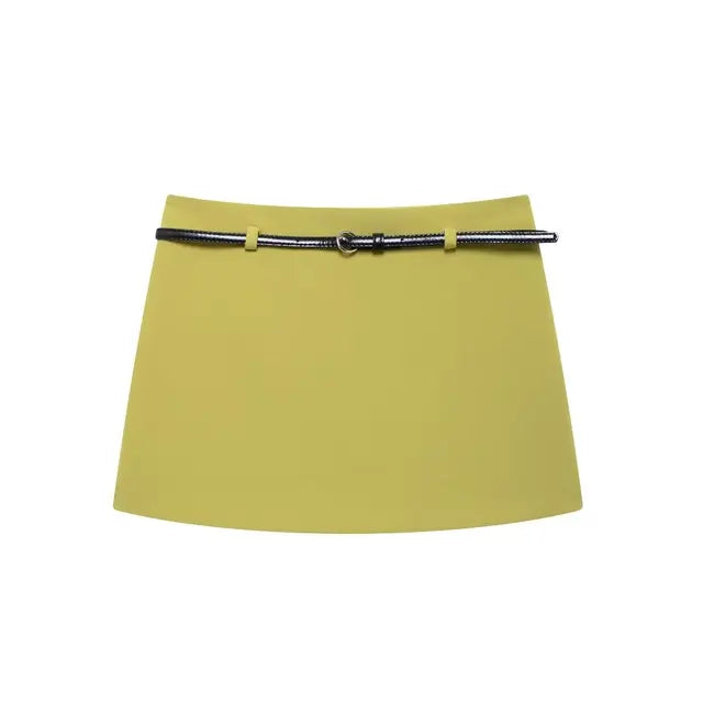 Wear a waist belt slim fit shirt and skirt